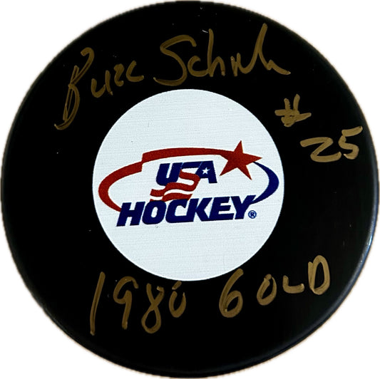 USA Hockey Puck Signed by Billy Schneider ( Buzz Schneider ) -Black