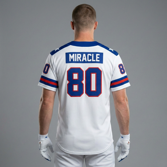Back view of a white football jersey with the name Miracle and number 80 in blue and red