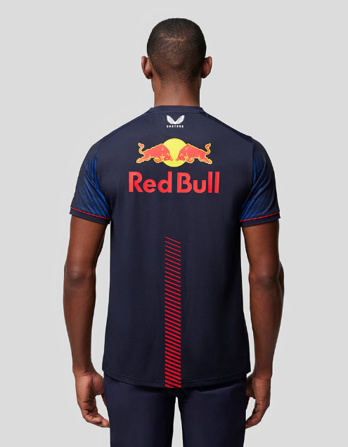 Back view of a navy blue Red Bull racing t-shirt with red branding and Castore logo