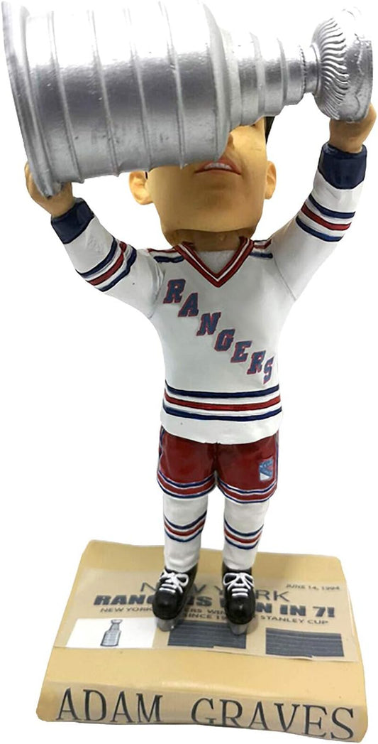 Adam Graves bobblehead figure holding the Stanley Cup trophy on a base with New York Rangers branding