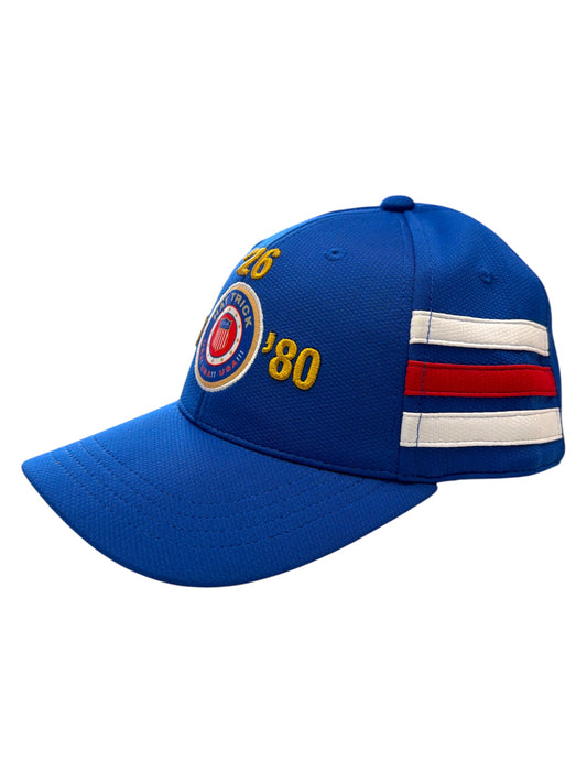 Blue baseball cap with USA Hat Trick 76 80 embroidery and red and white side stripes