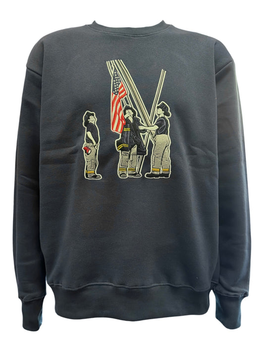 Black sweatshirt with embroidered graphic of three firefighters holding an American flag