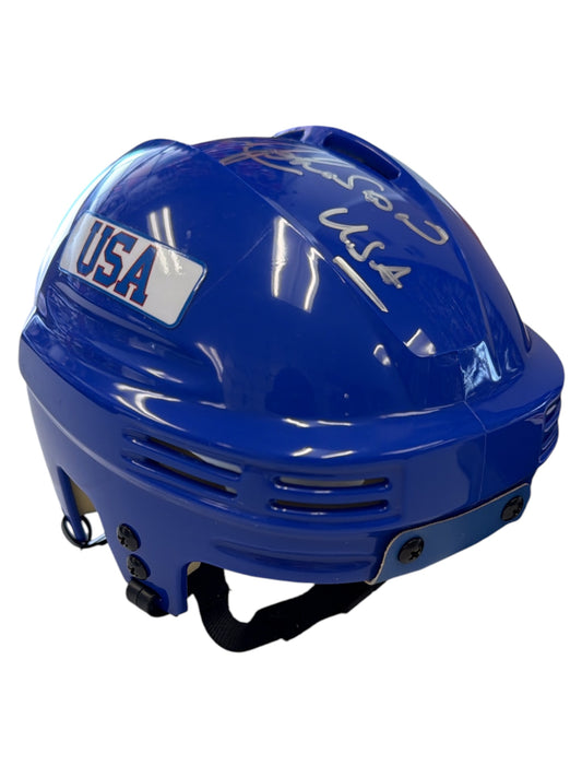 Blue USA hockey helmet with silver autograph