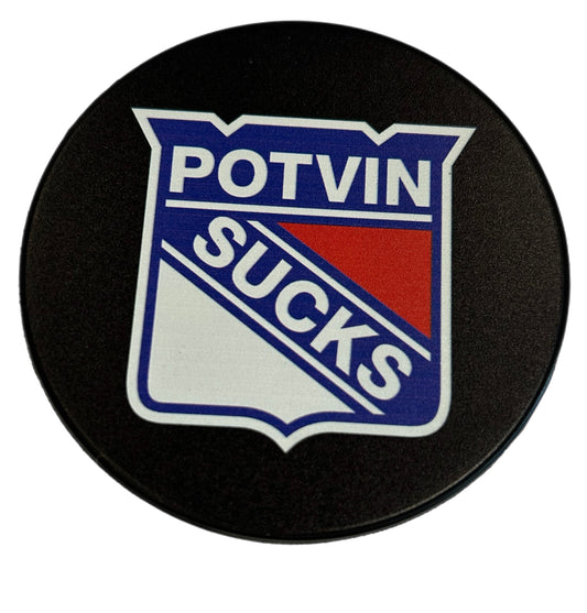 Black hockey puck with a shield graphic reading Potvin Sucks