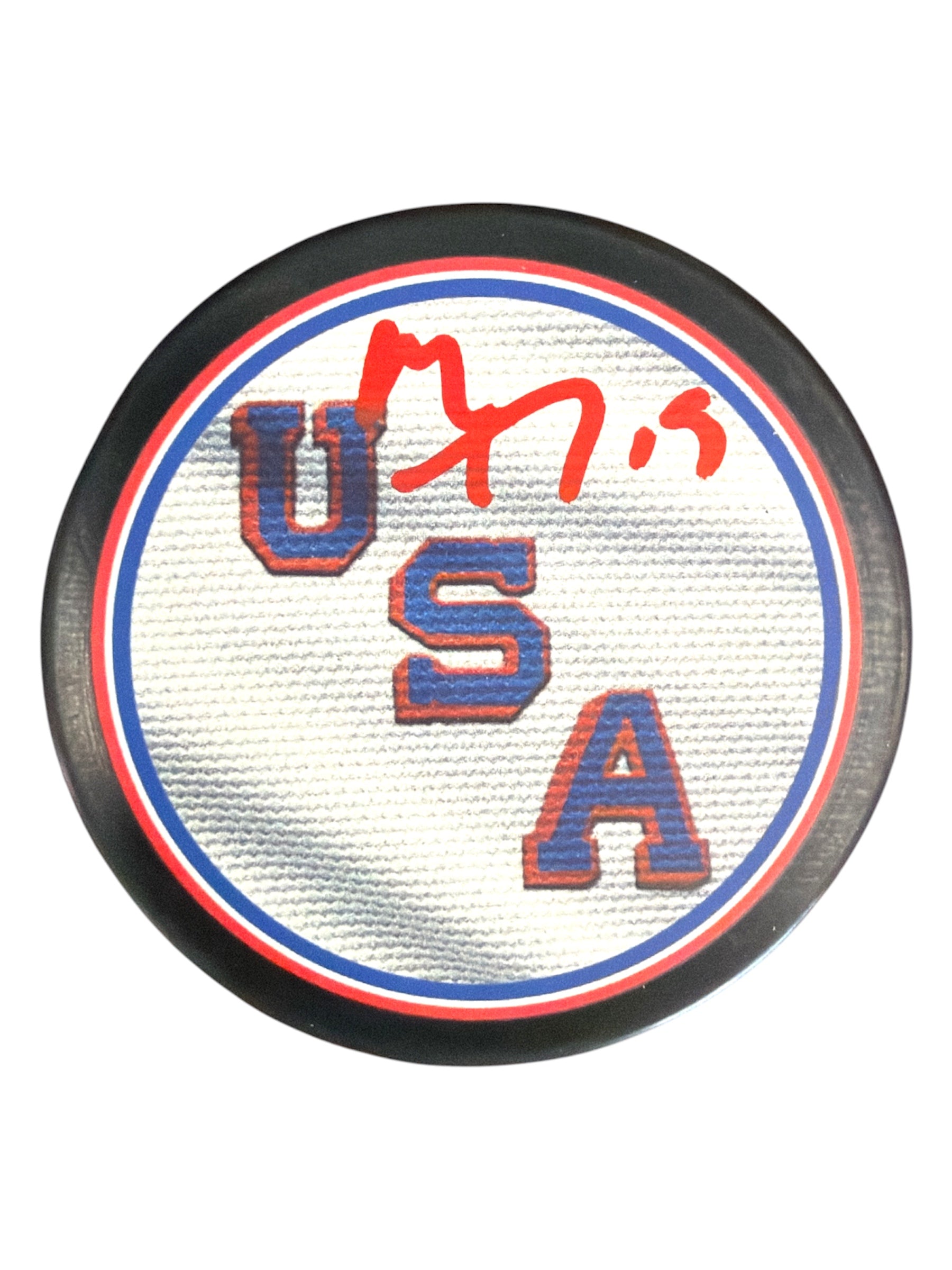Hockey puck with USA logo and red marker autograph