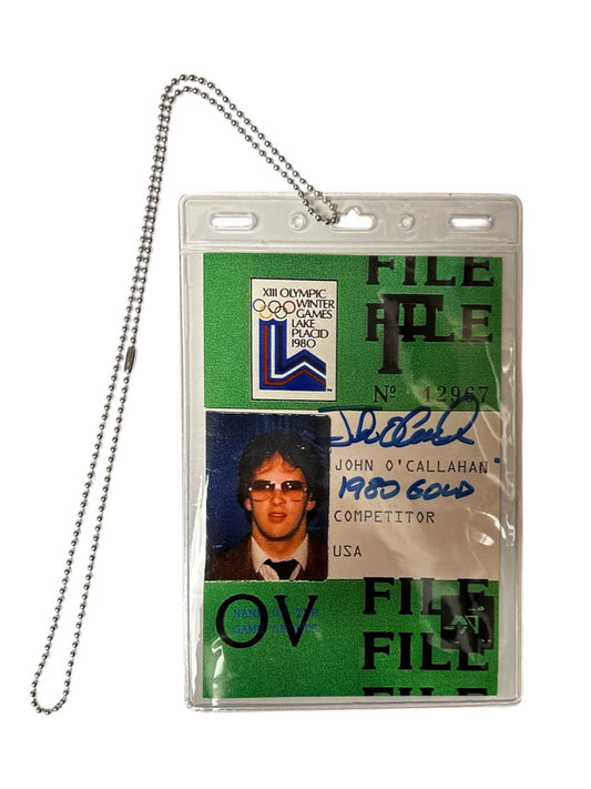 1980 Lake Placid Winter Olympics competitor badge for John O Callaghan with signature and metal chain