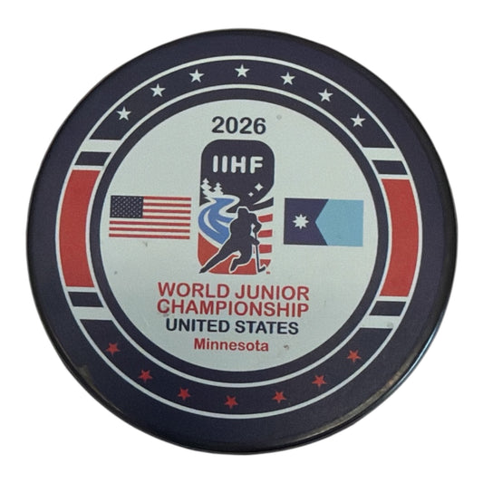 2026 IIHF World Junior Championship hockey puck with US flag and Minnesota state flag
