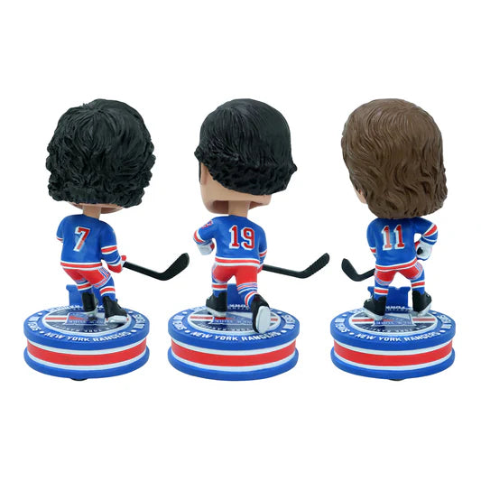 Three New York Rangers hockey player bobbleheads viewed from behind