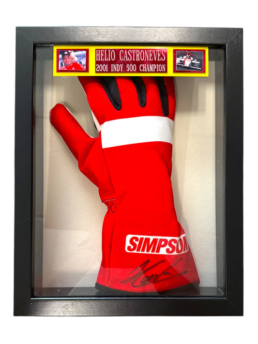 Framed red racing glove signed by Helio Castroneves with 2001 Indy 500 champion plaque