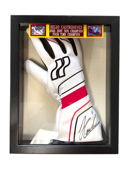 Framed Helio Castroneves signed racing glove with Indy 500 champion plaque