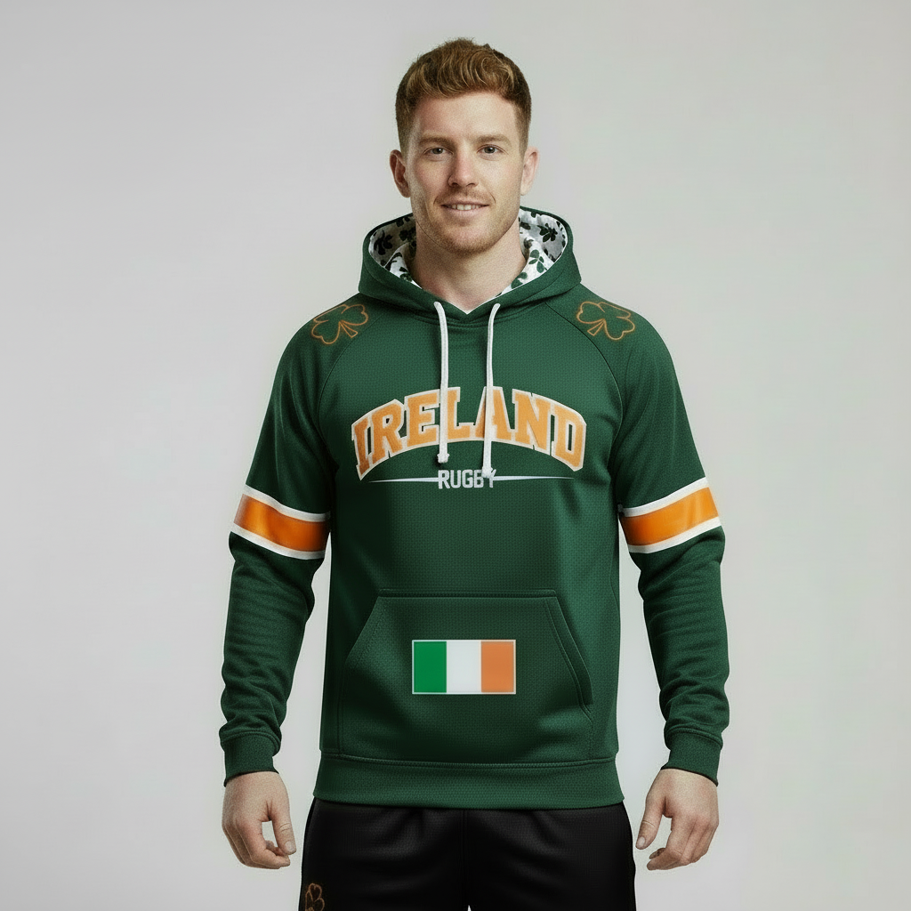 Man wearing a green Ireland rugby hoodie with shamrock details and an Irish flag graphic