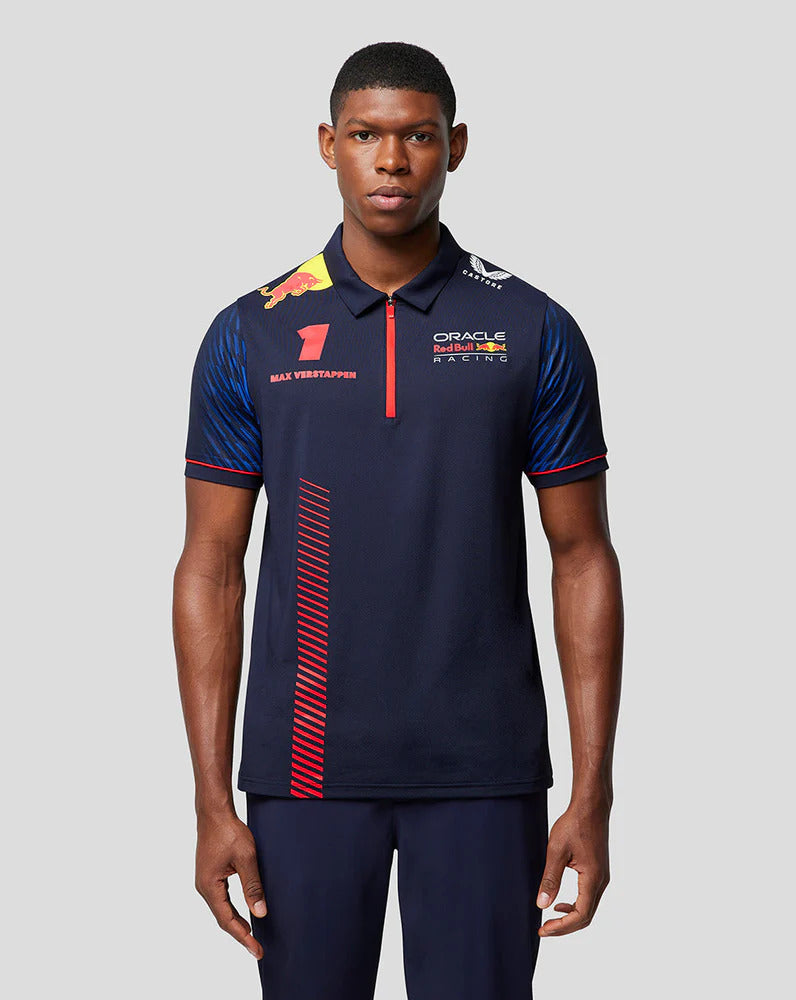 Man wearing a navy blue Oracle Red Bull Racing polo shirt with team branding and Max Verstappen name