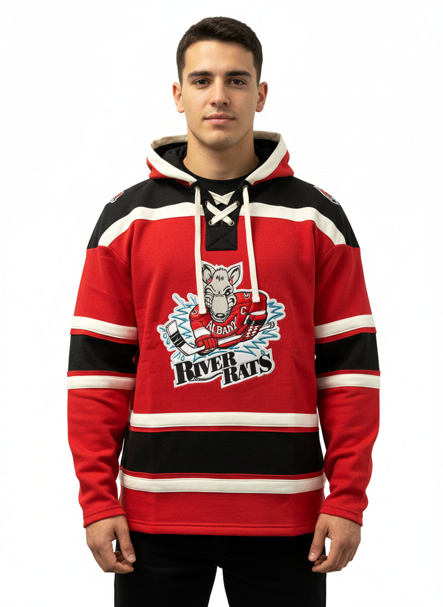 Man wearing a red black and white Albany River Rats hockey hoodie with lace up collar