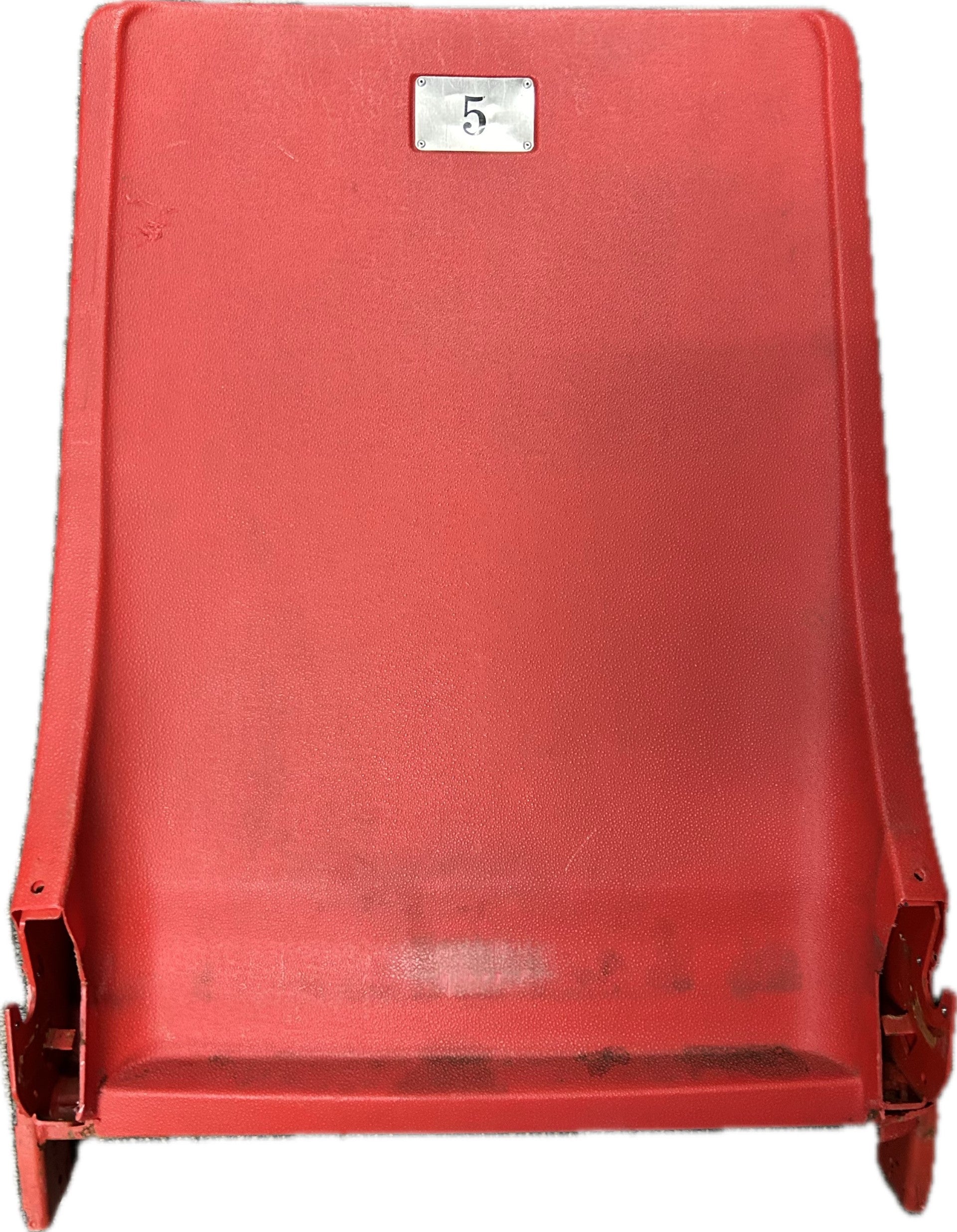 Red stadium seat back with a metal number five plate