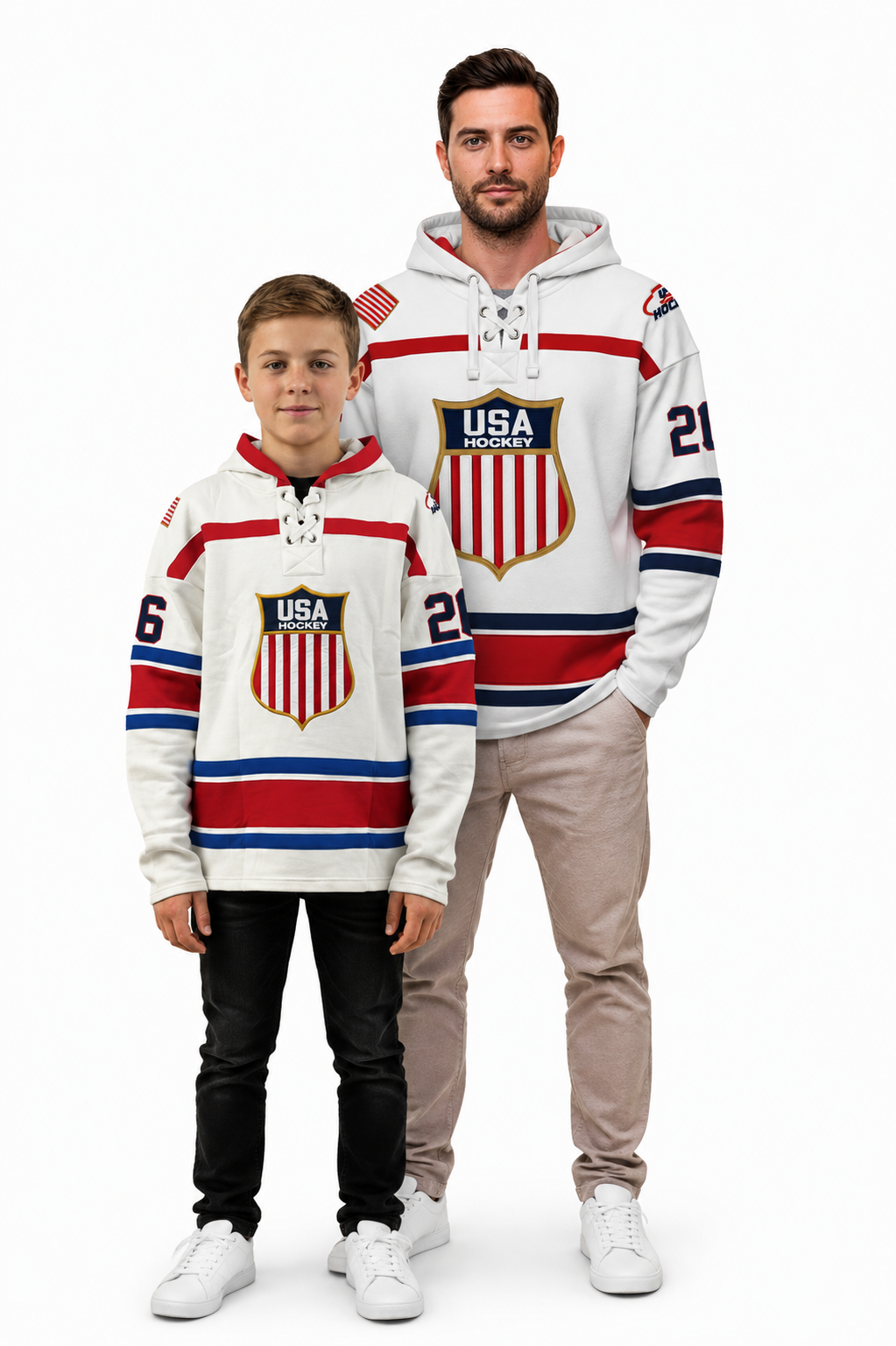 A man and a boy modeling matching USA hockey-themed hoodies against a plain white studio background. The hoodies are white with red and blue stripes, a red-and-white shield crest reading USA, and numbered sleeves.