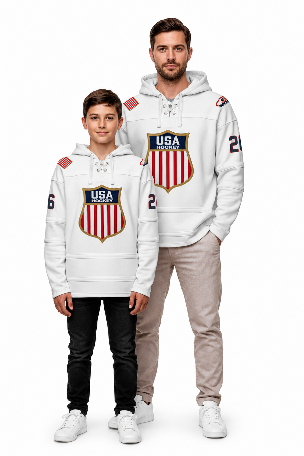A man and a boy modeling matching white hoodies with a red, white, and blue USA Hockey shield logo on the chest, set against a plain white background.