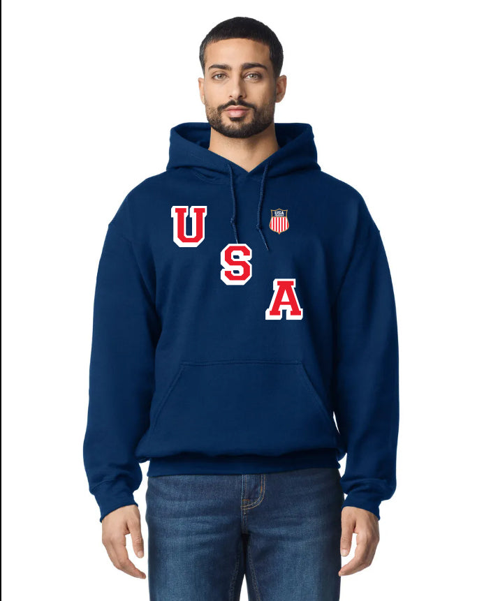 Man wearing a navy blue hooded sweatshirt with USA lettering and a USA Cricket logo