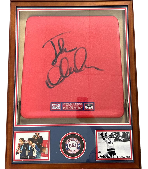 1980 Miracle on ice arena seat bottom with PUCK- Signed by Jack O'Callahan- FRAMED